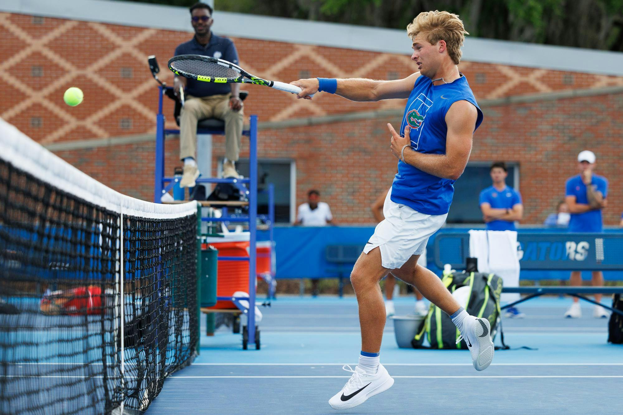 Florida tennis player Kevin Edengren hits the ball during an NCAA tennis match against Vanderbilt, Thursday, April 2, 2026, in Gainesville, Fla.
