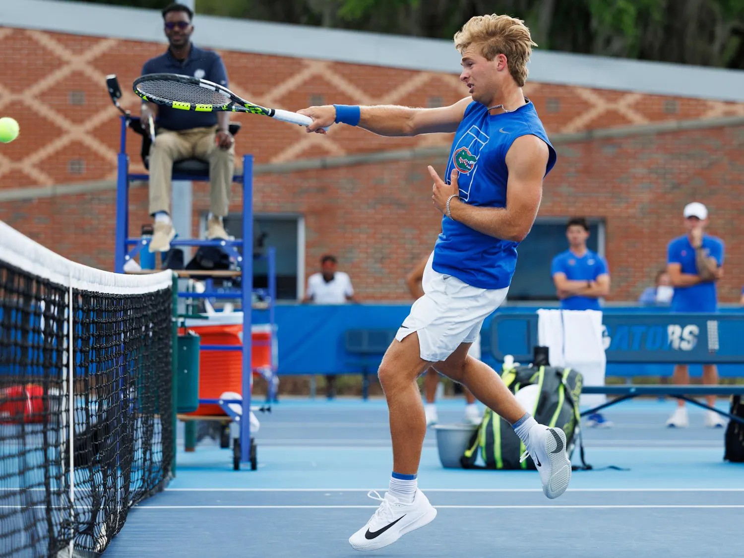 Florida tennis player Kevin Edengren hits the ball during an NCAA tennis match against Vanderbilt, Thursday, April 2, 2026, in Gainesville, Fla.