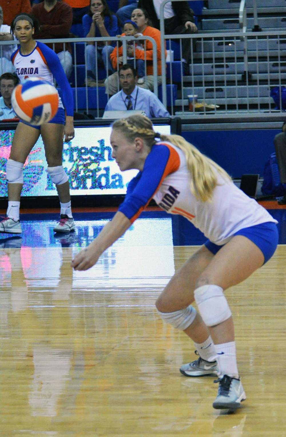 <p>Maddy Monserez digs a ball during Florida's 3-0 win against Missouri on Friday in the O'Connell Center.</p>