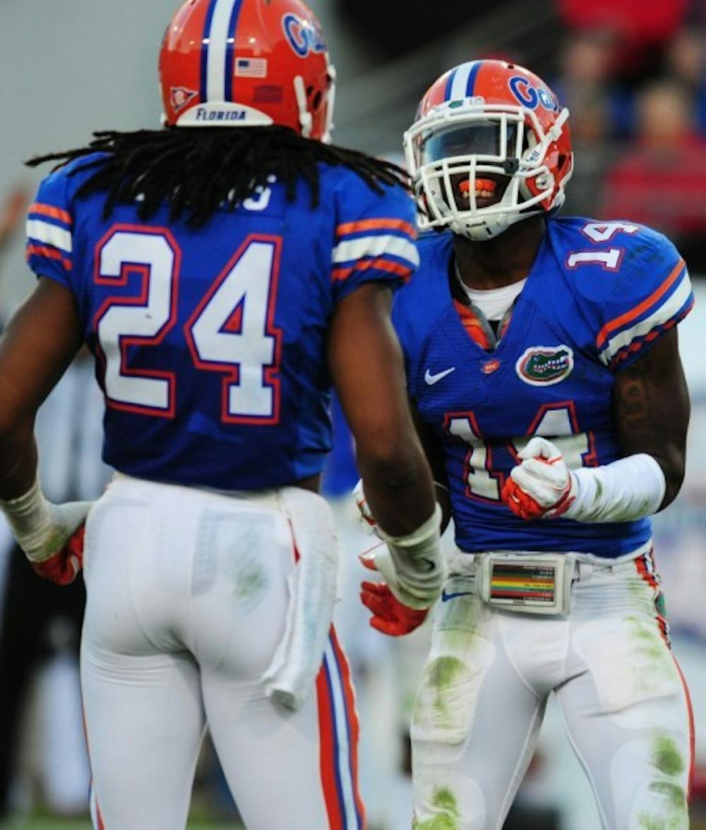 <p>Senior safety Josh Evans (24) said junior Jaylen Watkins (14) has the potential to be the shutdown cornerback the Gators’ defense lacked last season.</p>