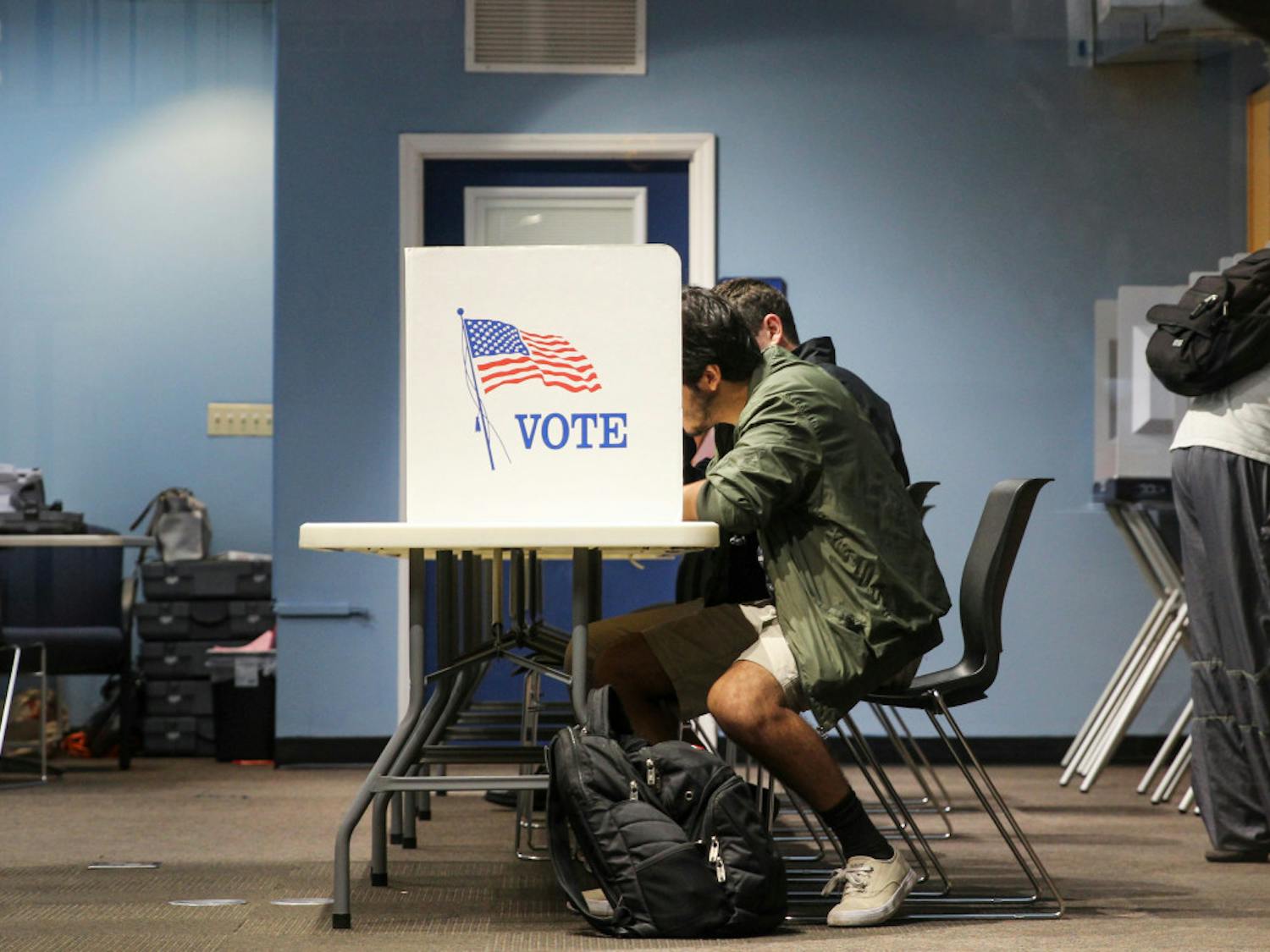Nestor Garcia, a 21-year-old industrial engineer major, attends the early voting session on Oct. 22, 2018, at the J. Wayne Reitz Union to vote for the first time.