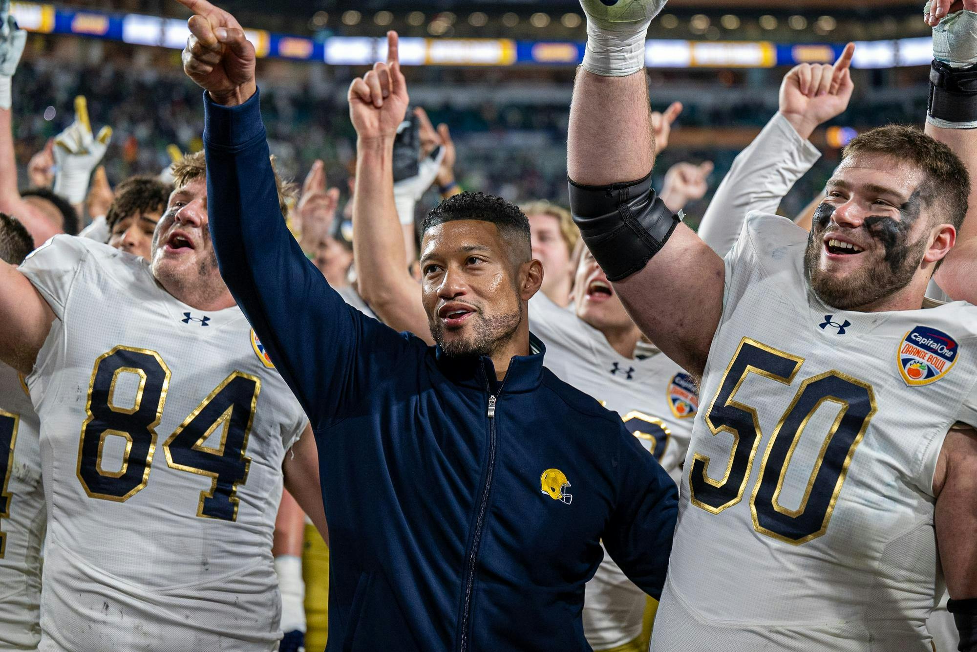 Notre Dame head coach Marcus Freeman celebrates with his team after the Capital One Orange Bowl on Thursday, January 9, 2025, in Miami Gardens, Fla.