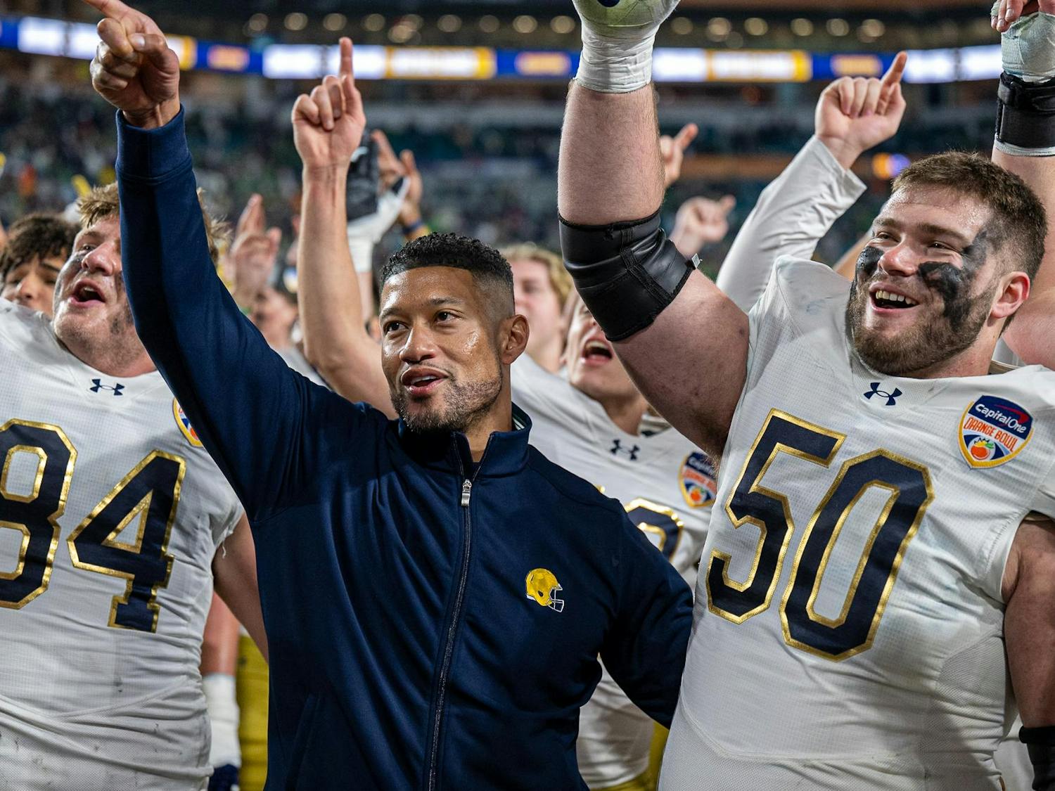 Notre Dame head coach Marcus Freeman celebrates with his team after the Capital One Orange Bowl on Thursday, January 9, 2025, in Miami Gardens, Fla.
