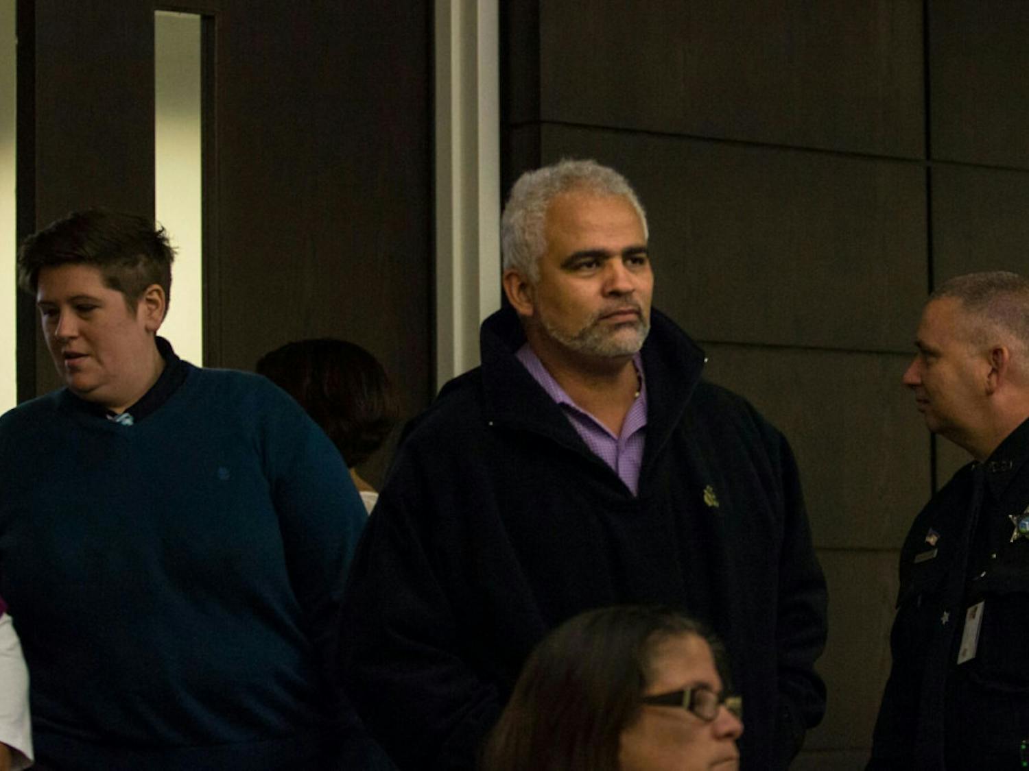 Carlos Aguilar enters the courtroom Monday.