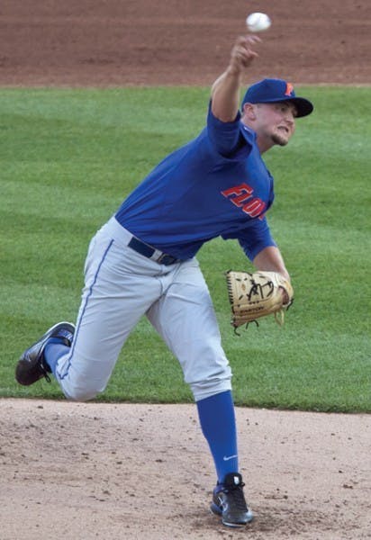 Florida starting pitcher Karsten Whitson works against South Carolina in the first inning of Game 2 of the NCAA baseball College World Series best-of-three finals, in Omaha, Neb., Tuesday, June 28, 2011. (AP Photo/Nati Harnik)