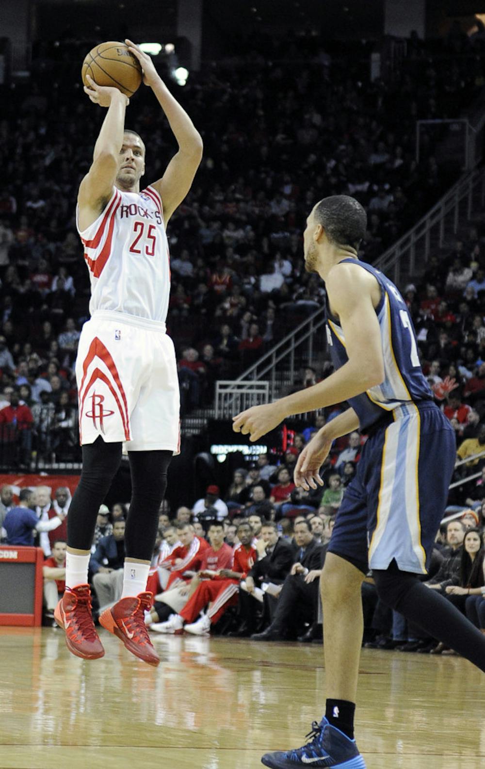 <p>Houston Rockets’ Chandler Parsons (25) shoots a three-point shot as Memphis Grizzlies’ Tayshaun Prince watches on Jan. 24 in Houston.</p>