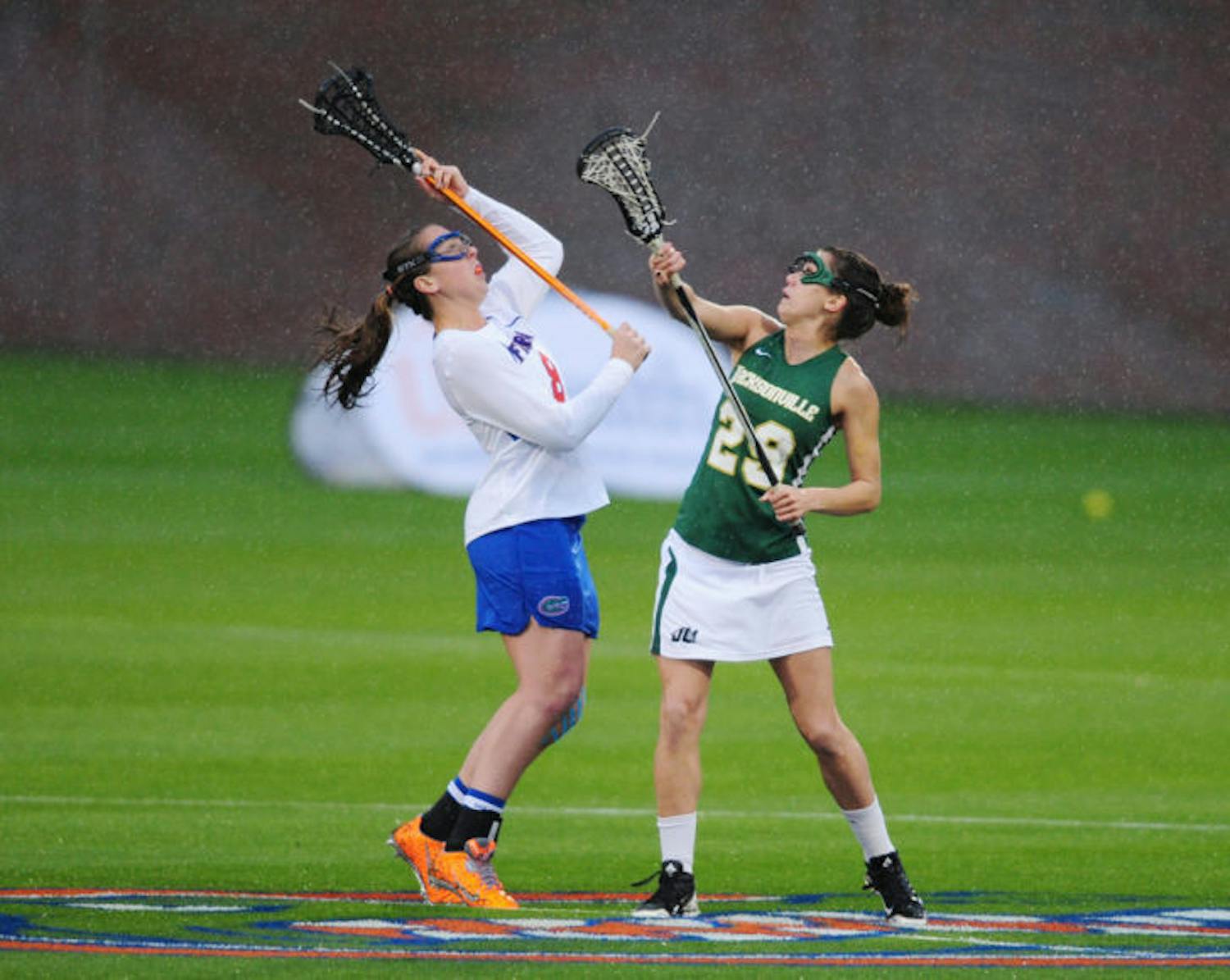 Shannon Gilroy fights for the ball during Florida’s 21-5 win against Jacksonville on Feb. 12 at Donald R. Dizney Stadium. Gilroy leads the Gators with 35 goals this season.