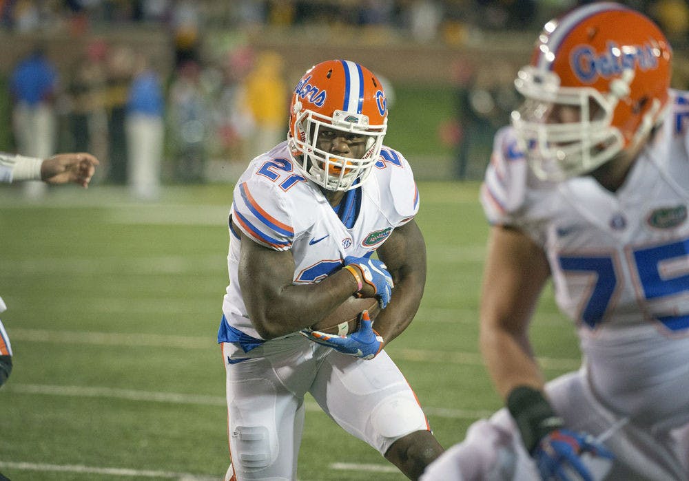 <p>UF running back Kelvin Taylor runs in for a touchdown during Florida's 21-3 win against Missouri on Oct. 10, 2015, at Faurot Field in Columbia, Missouri.</p>