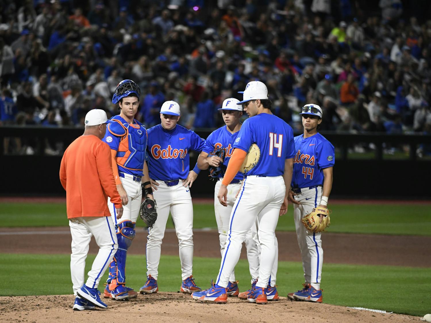 Florida baseball head coach Kevin O'Sullivan takes a mound visit during the Gators' win over Columbia University on Saturday, February 24, 2024. 