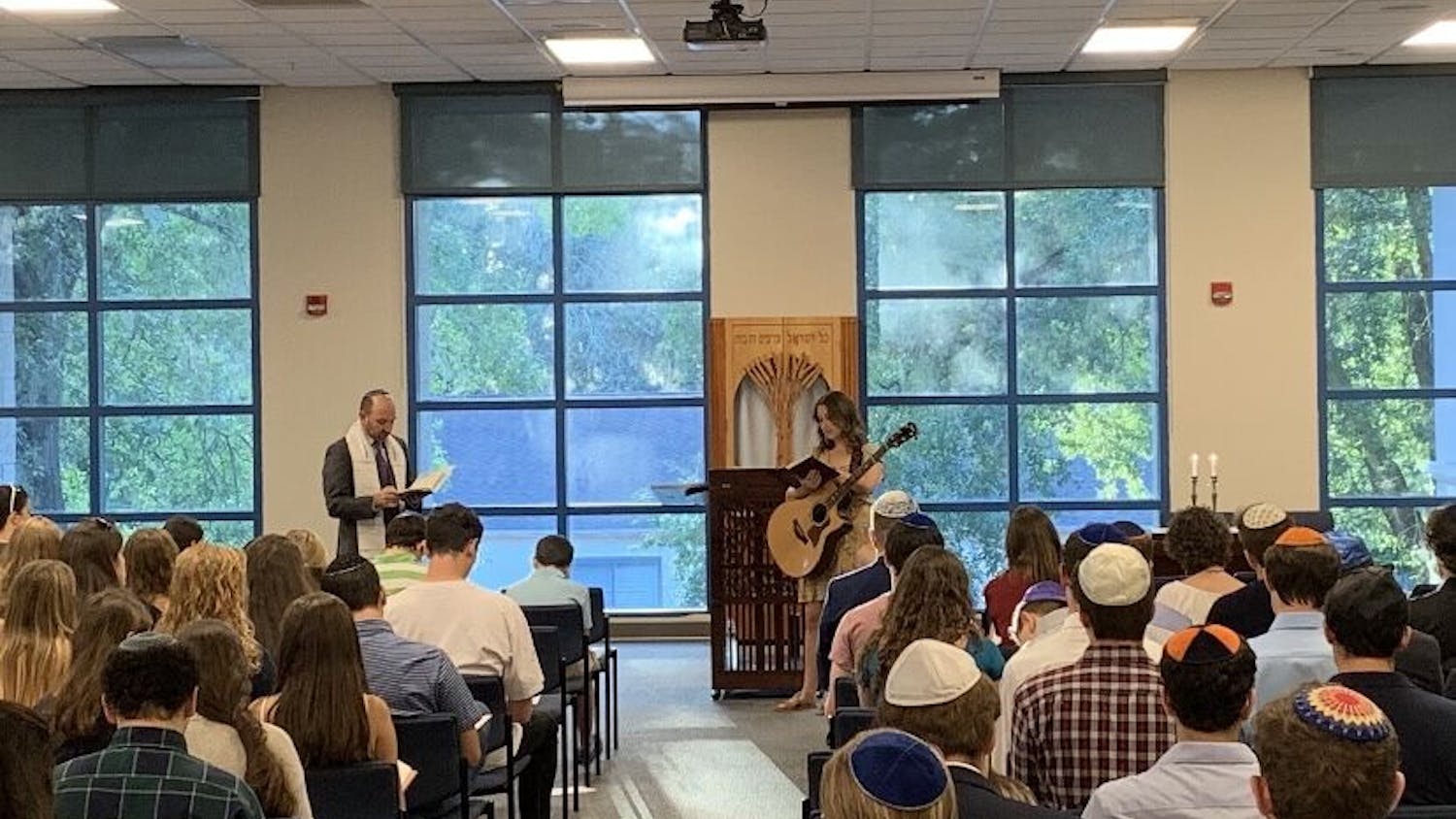 Rabbi Jonah Zinn leads High Holy Day services at UF Hillel last year.