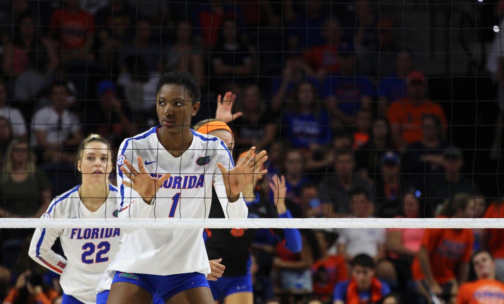 Rhamat Alhassan had nine kills and seven blocks in Florida's 3-0 win against Kentucky on Wednesday in Lexington.