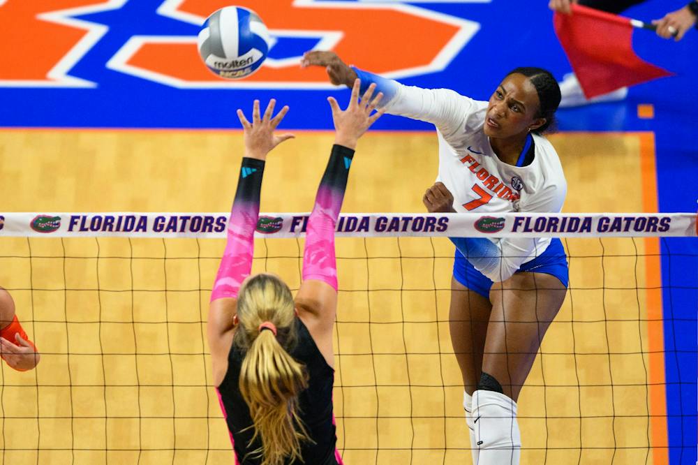 Florida outside hitter Kamryn Chaney (7) hits during an NCAA Volleyball match against FAU, Friday, Sept. 11, 2026, in Gainesville, Fla.