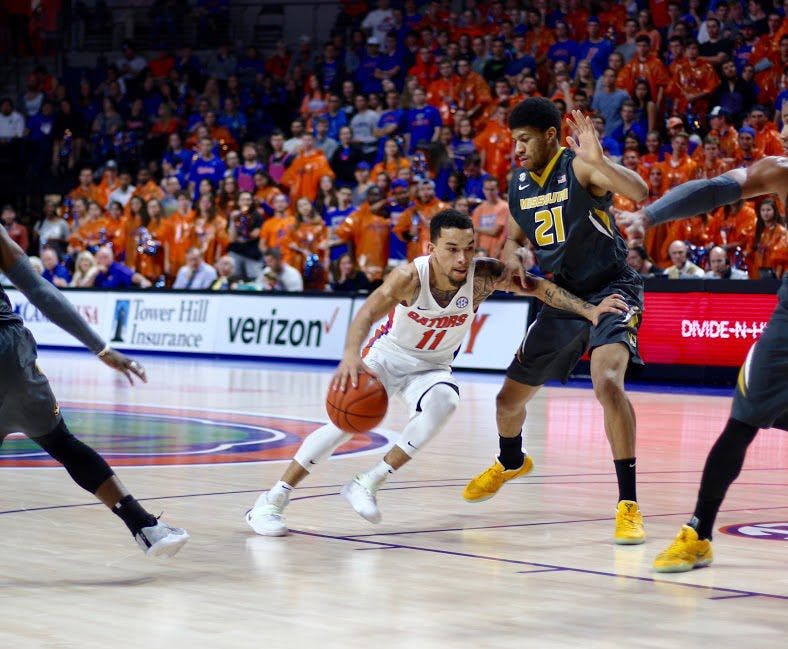 UF guard Chris Chiozza drives the lane during Florida's&nbsp;93-54 win over Missouri on Feb. 2, 2017, in the O'Connell Center.&nbsp;
93-54