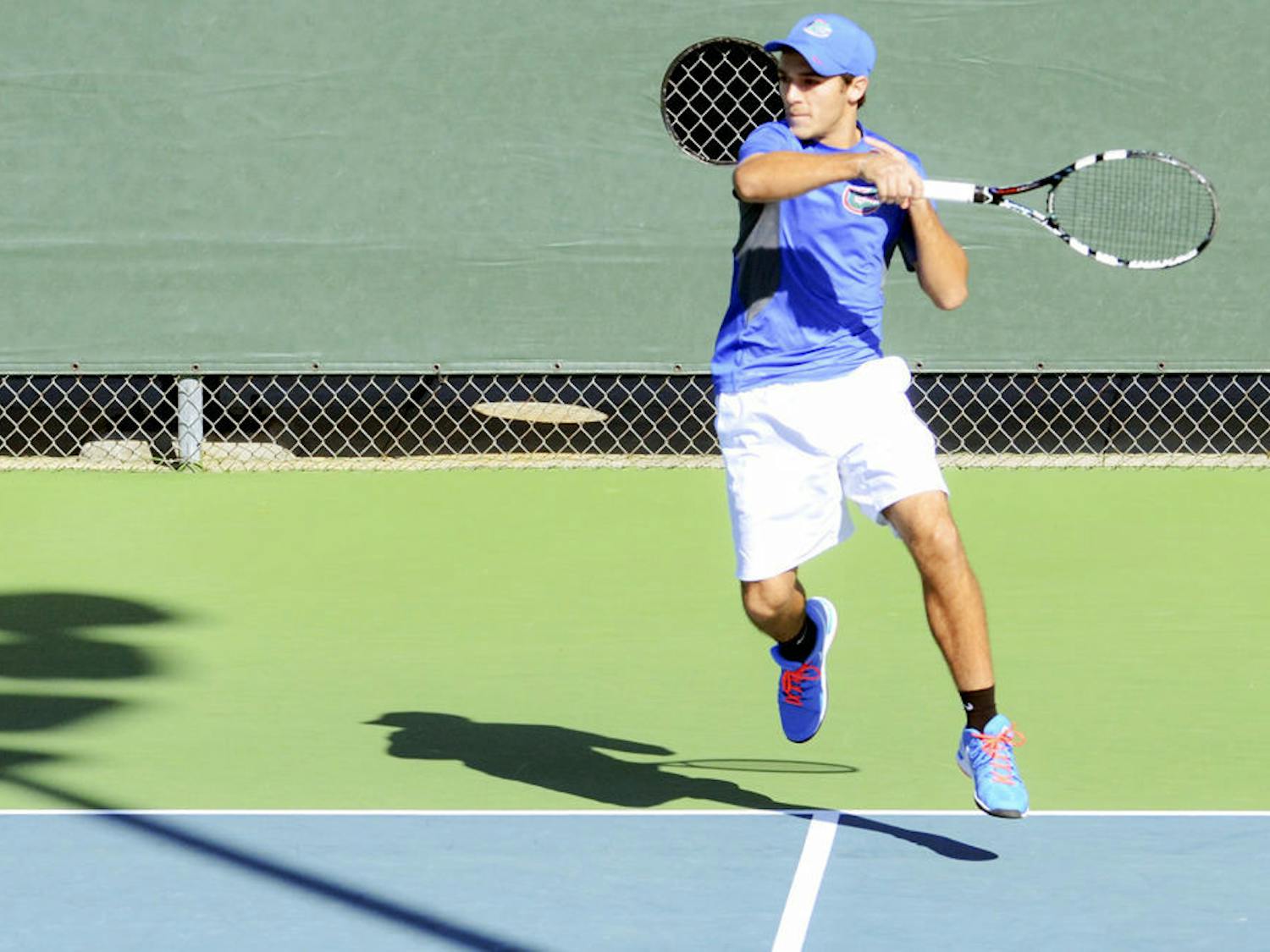 Freshman Chase Perez-Blanco hits the ball during Florida's 9-3 win against William & Mary at the Ring Tennis Complex.