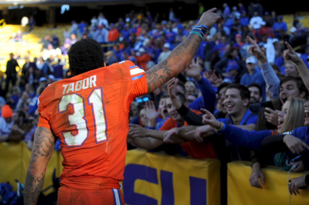 Jalen Tabor celebrates with fans after Florida's 16-10 win over LSU in Baton Rouge, Louisiana, on Nov. 19, 2016.