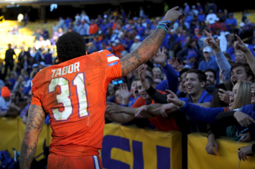 <p>Jalen Tabor celebrates with fans after Florida's 16-10 win over LSU in Baton Rouge, Louisiana, on Nov. 19, 2016.</p>