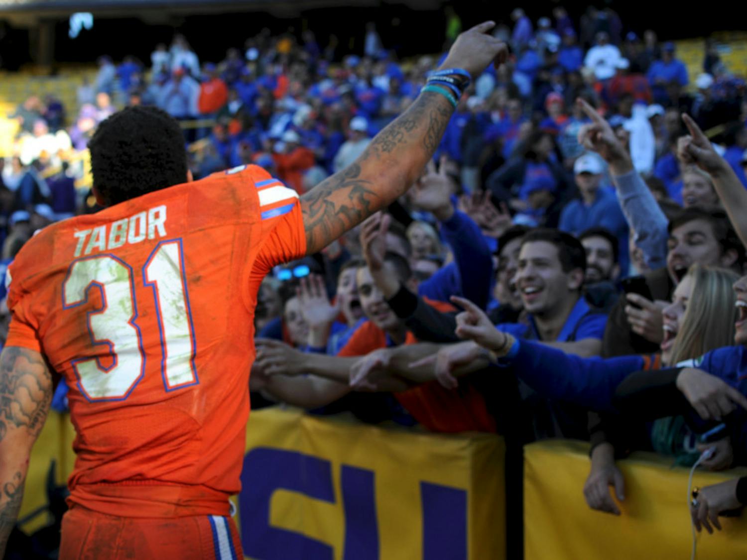 Jalen Tabor celebrates with fans after Florida's 16-10 win over LSU in Baton Rouge, Louisiana, on Nov. 19, 2016.