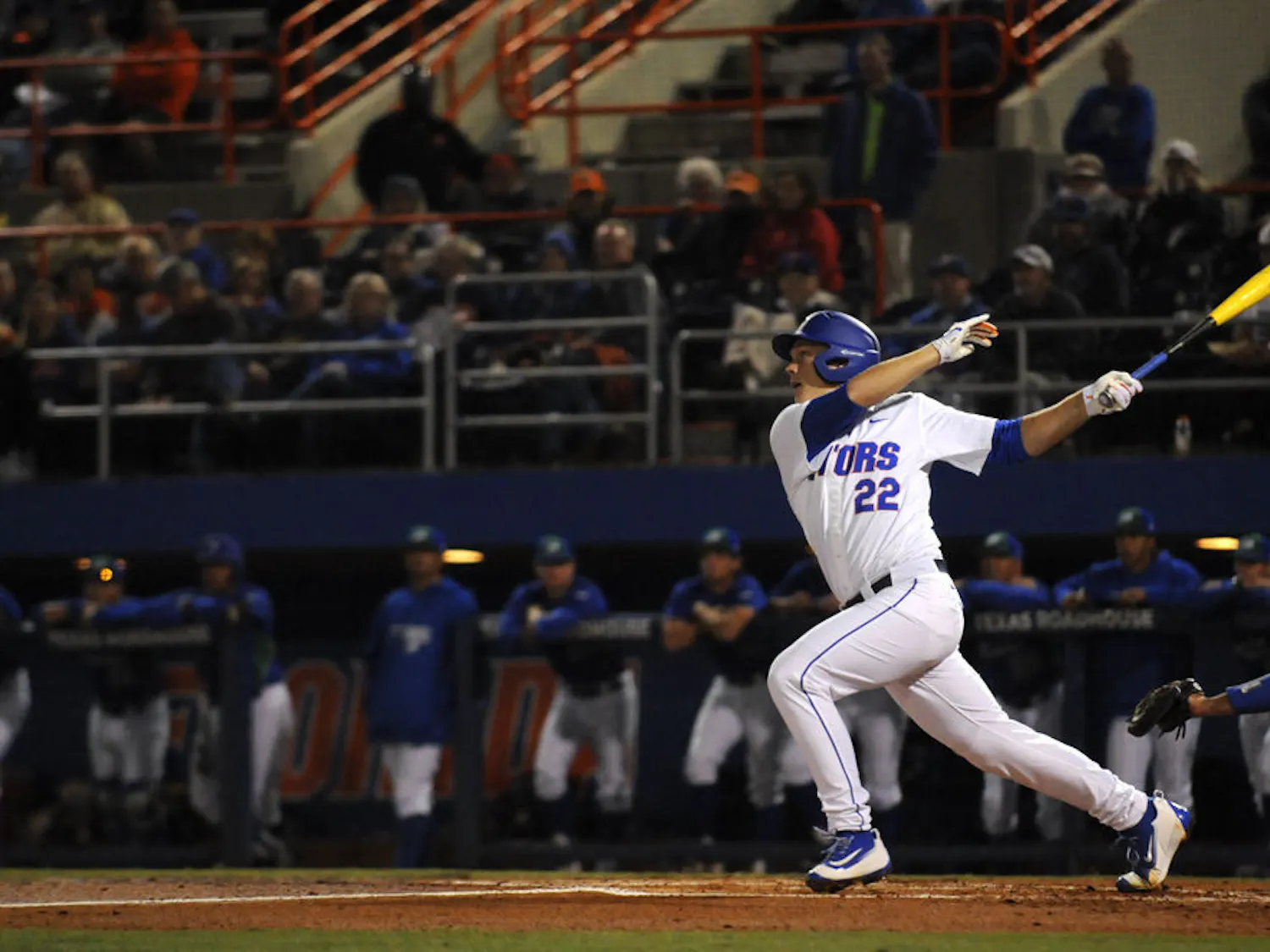 JJ Schwarz follows through on a swing during Florida's 4-2 win against Florida Gulf Coast on Feb. 19, 2016, at McKethan Stadium.