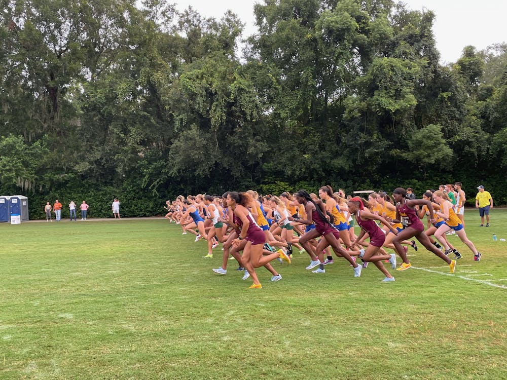 Runners start the women's race during the 2021 Mountain Dew Invitational in Gainesville, Florida on Sept. 11, 2021