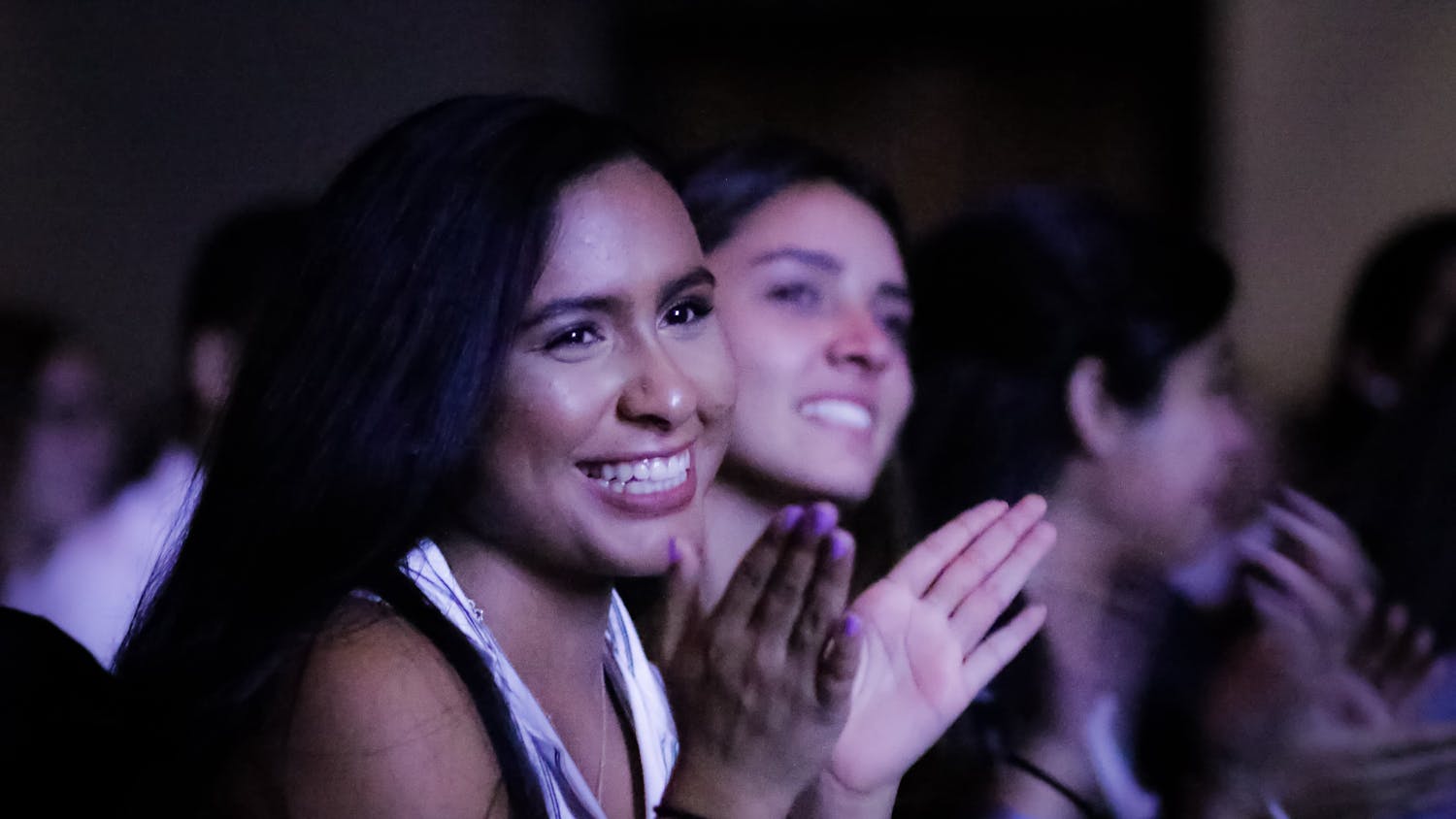 Alexia Yau, a 19-year-old UF natural resource conservation junior, cheers as Julissa Calderon, a Buzzfeed video producer and the keynote speaker at the UF Hispanic-Latinx Student Assembly, concludes her presentation.