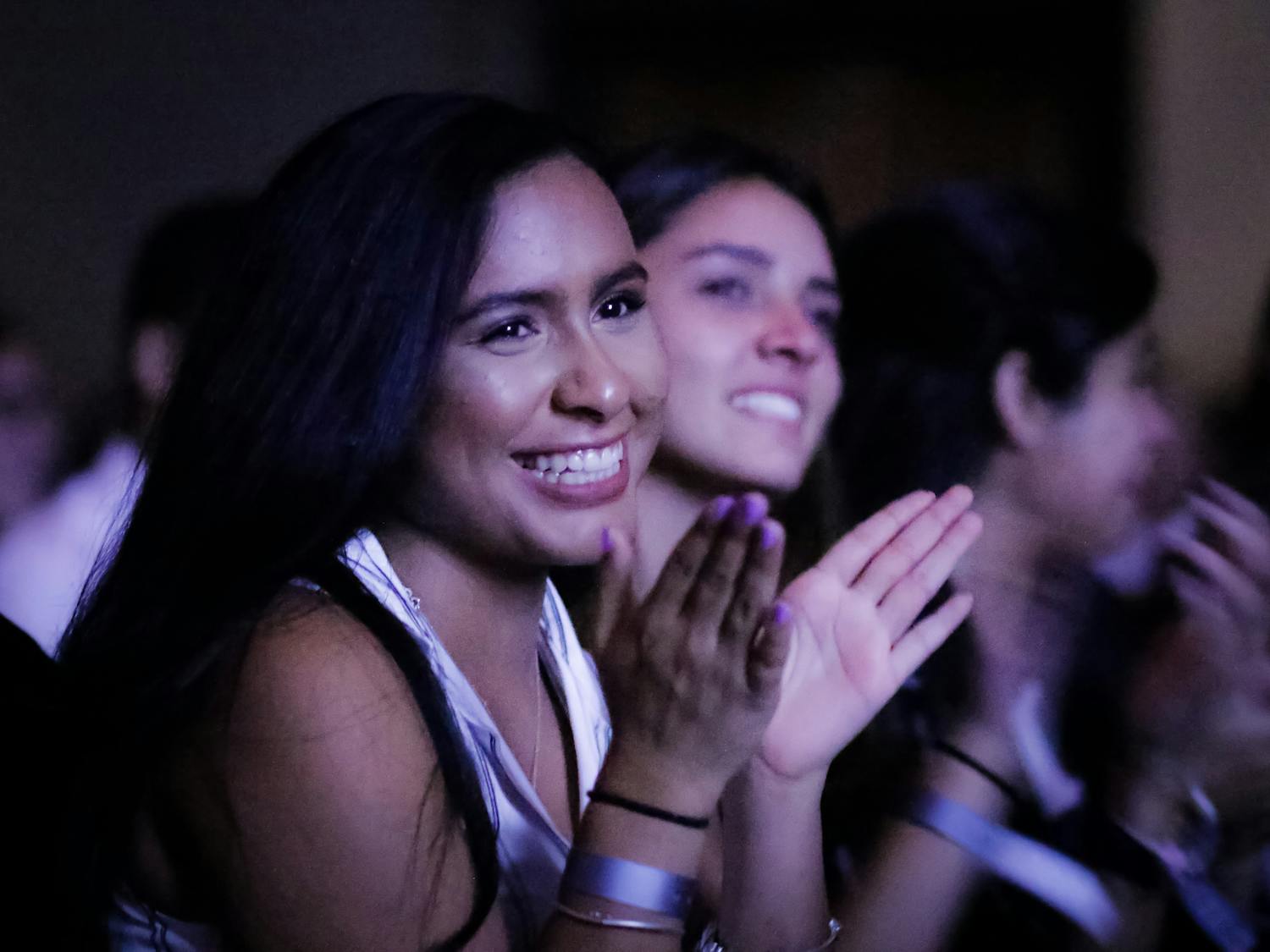 Alexia Yau, a 19-year-old UF natural resource conservation junior, cheers as Julissa Calderon, a Buzzfeed video producer and the keynote speaker at the UF Hispanic-Latinx Student Assembly, concludes her presentation.