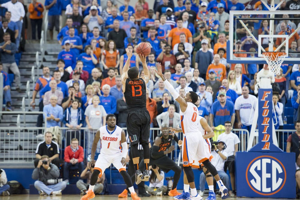 Miami's Angel Rodriguez attempts a shot during the Hurricanes' win against the Gators on Monday in the O'Connell Center.