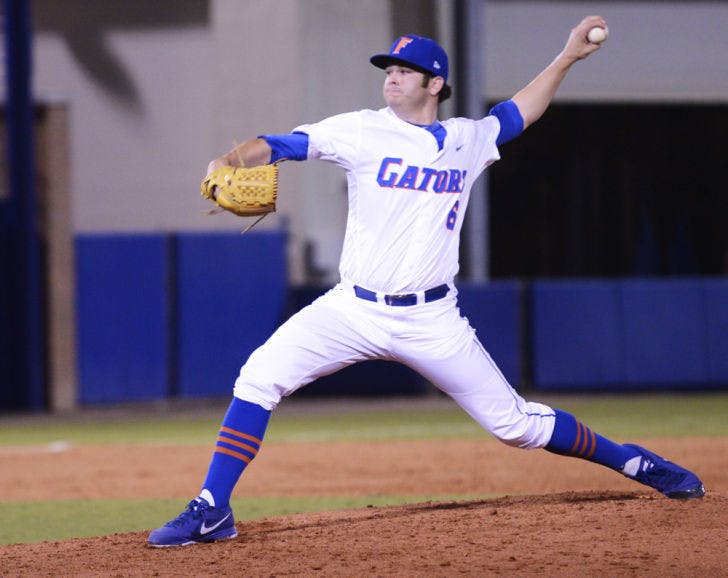 Left-handed reliever Daniel Gibson throws a pitch in the sixth inning of Florida’s 8-2 loss against Florida Gulf Coast on Feb. 22 at McKethan Stadium. The Arizona Diamondbacks selected Gibson 210th overall Friday on the second day of the MLB First-Year Player Draft.&nbsp;