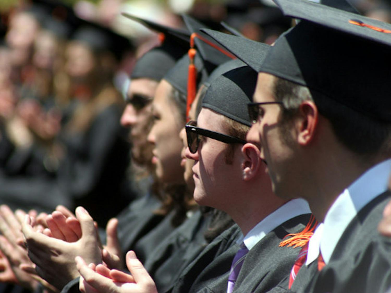 Despite an increase in enrollment, the percentage of students finishing their college degrees within four years has remained about the same, according to a report by Complete College America.