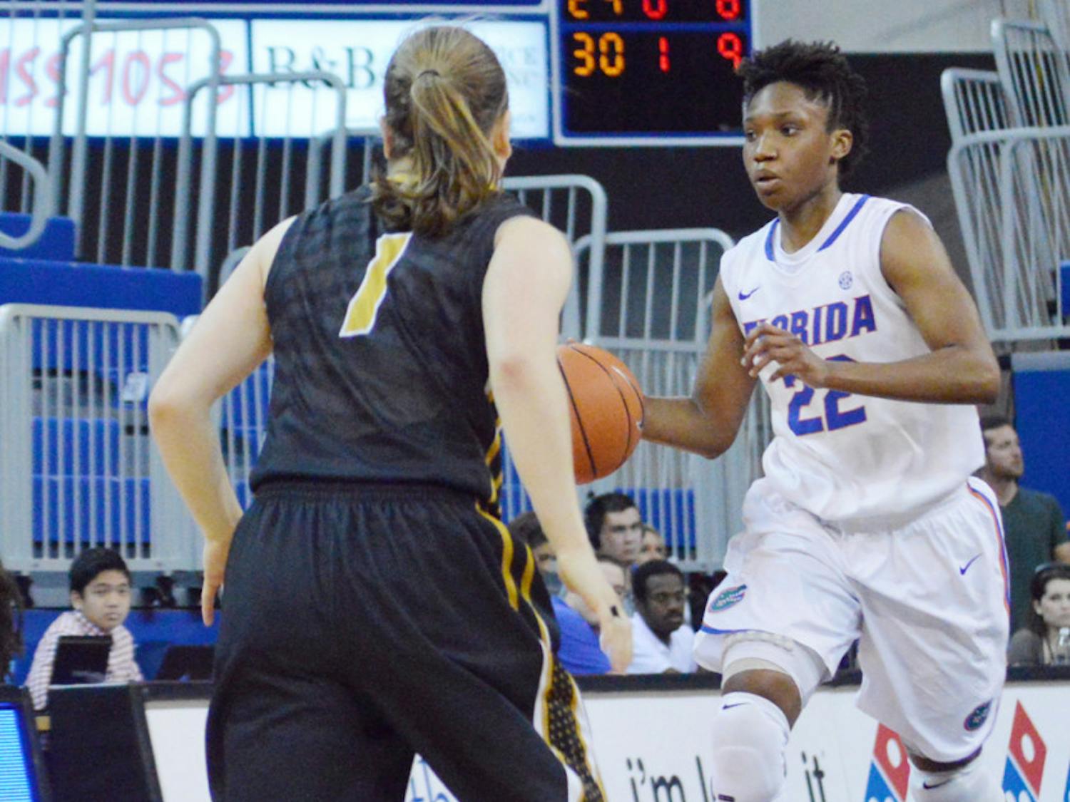 Kayla Lewis drives down the court during Florida’s 81-76 loss against Missouri on Feb. 20 in the O’Connell Center.
