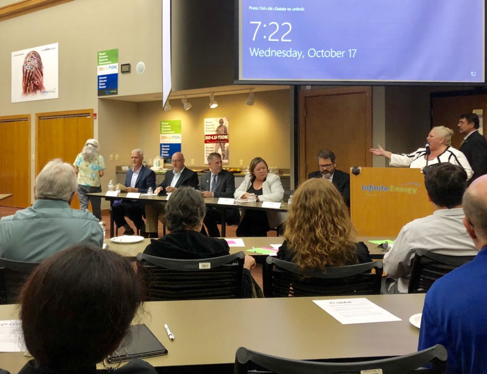 Julie Waldman, president of the Leadership of Gainesville Association, makes her close remarks at the GRU Bill Forum where a panel: Mary Alford, the chair of the GRU Utility Advisory Board; Darin Cook, the CEO of Infinite Energy; State Sen. Keith Perry; and Harvey Ward, a Gainesville city commissioner discussed the implications of the Gainesville Regional Utilities Referendum.