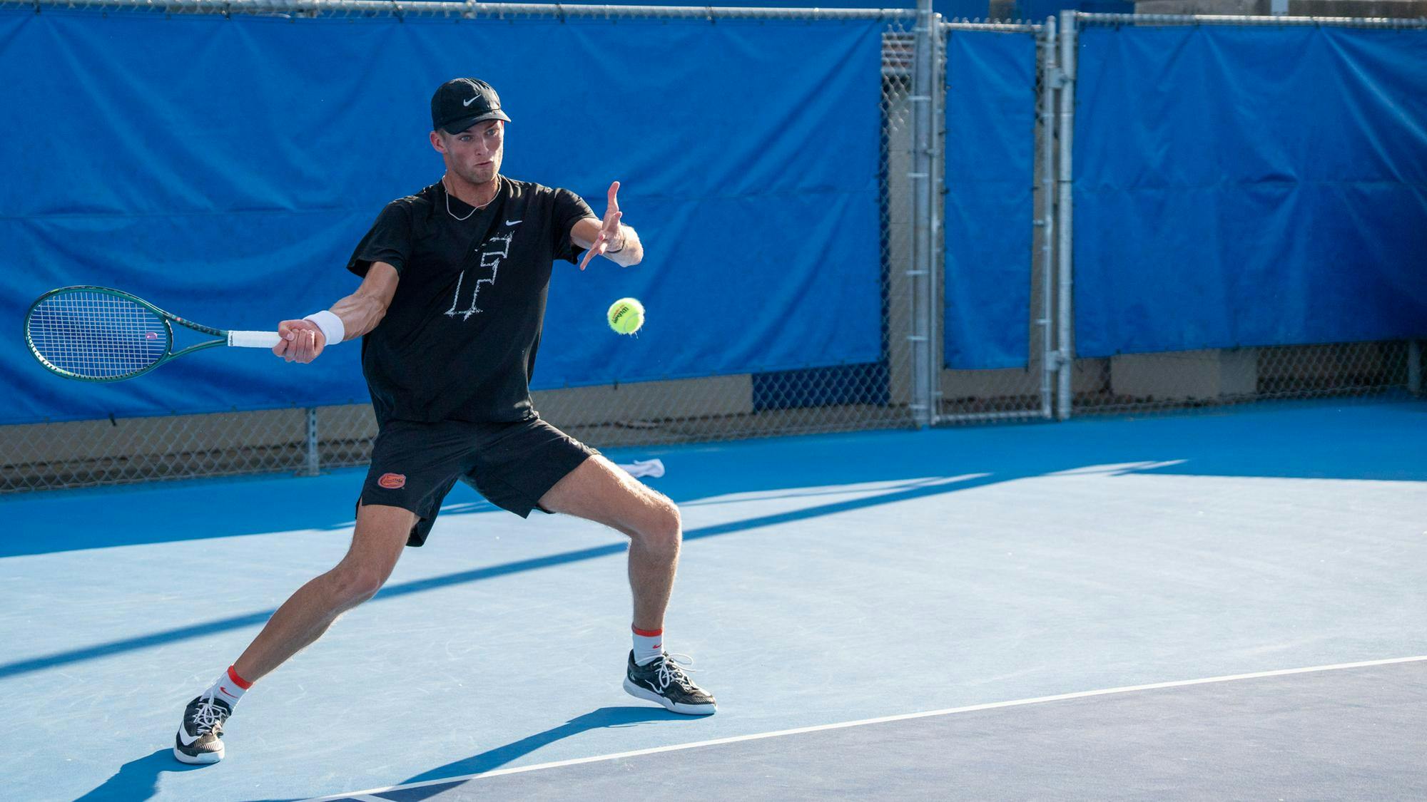 Florida’s Henry Jefferson returns the ball in a NCAA men's doubles tennis match against Texas Christian University, Tuesday, March 10, 2026, in Gainesville, Fla.