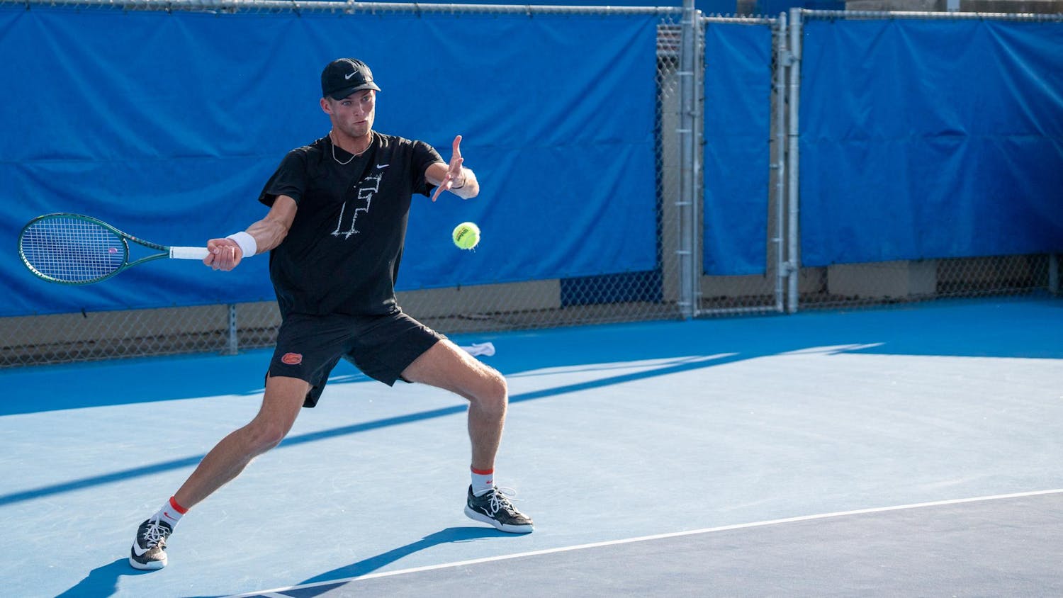 Florida’s Henry Jefferson returns the ball in a NCAA men's doubles tennis match against Texas Christian University, Tuesday, March 10, 2026, in Gainesville, Fla.