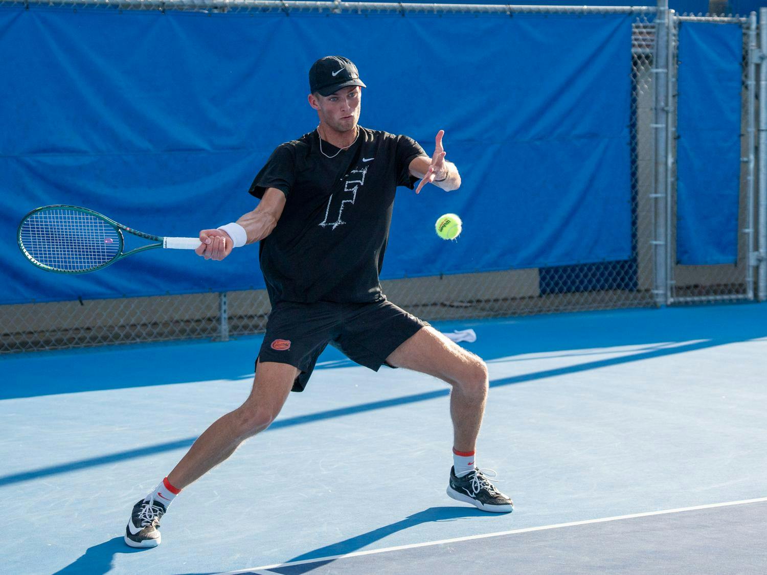 Florida’s Henry Jefferson returns the ball in a NCAA men's doubles tennis match against Texas Christian University, Tuesday, March 10, 2026, in Gainesville, Fla.