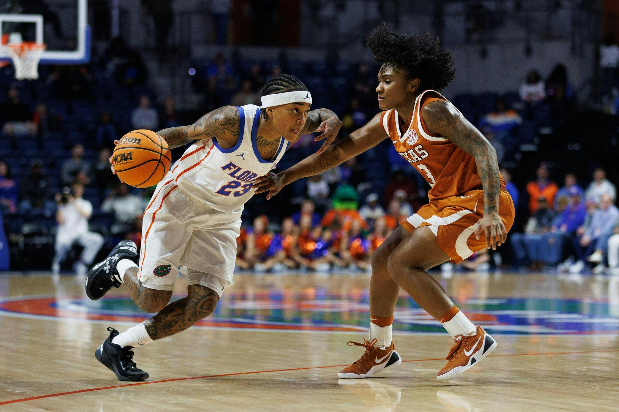 Florida guard Liv McGill (23) dribbles during the first half of an NCAA basketball game against Texas, Thursday, Jan. 29, 2026, in Gainesville, Fla.