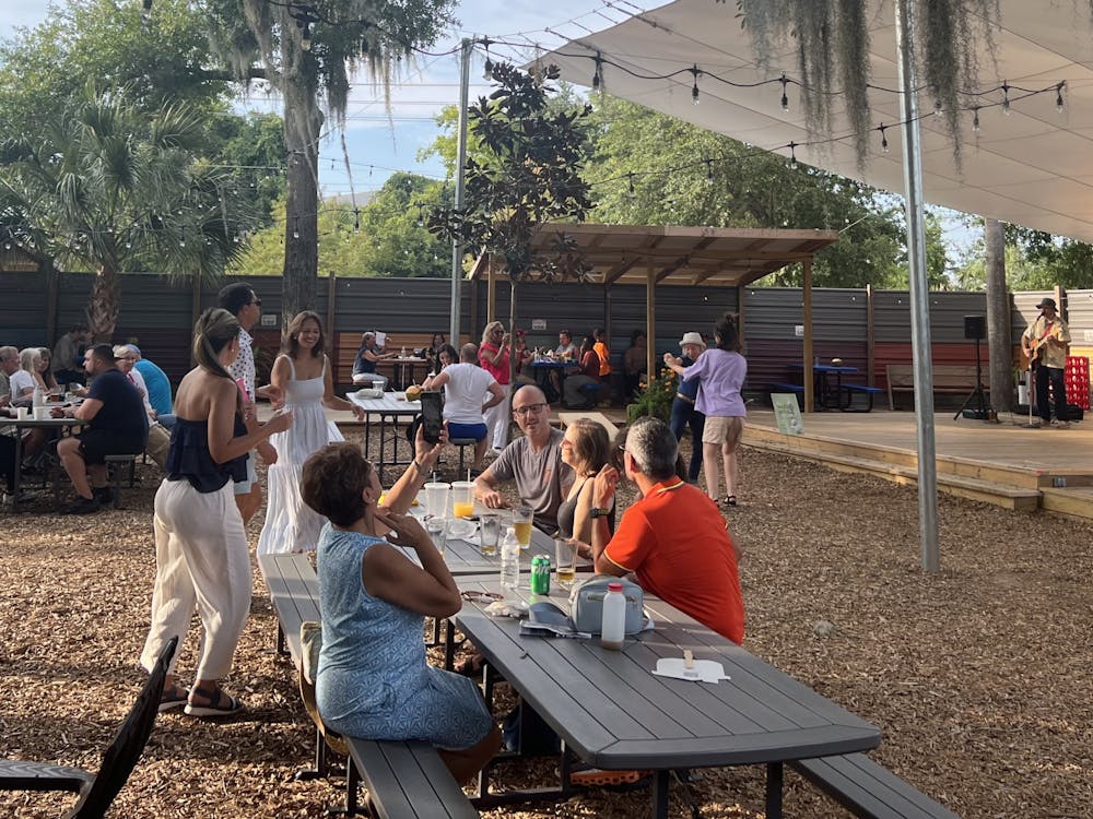 Attendees celebrate "Ceviche and Beer Festival" at First Magnitude Brewing Company on Saturday, July 13, 2024. 