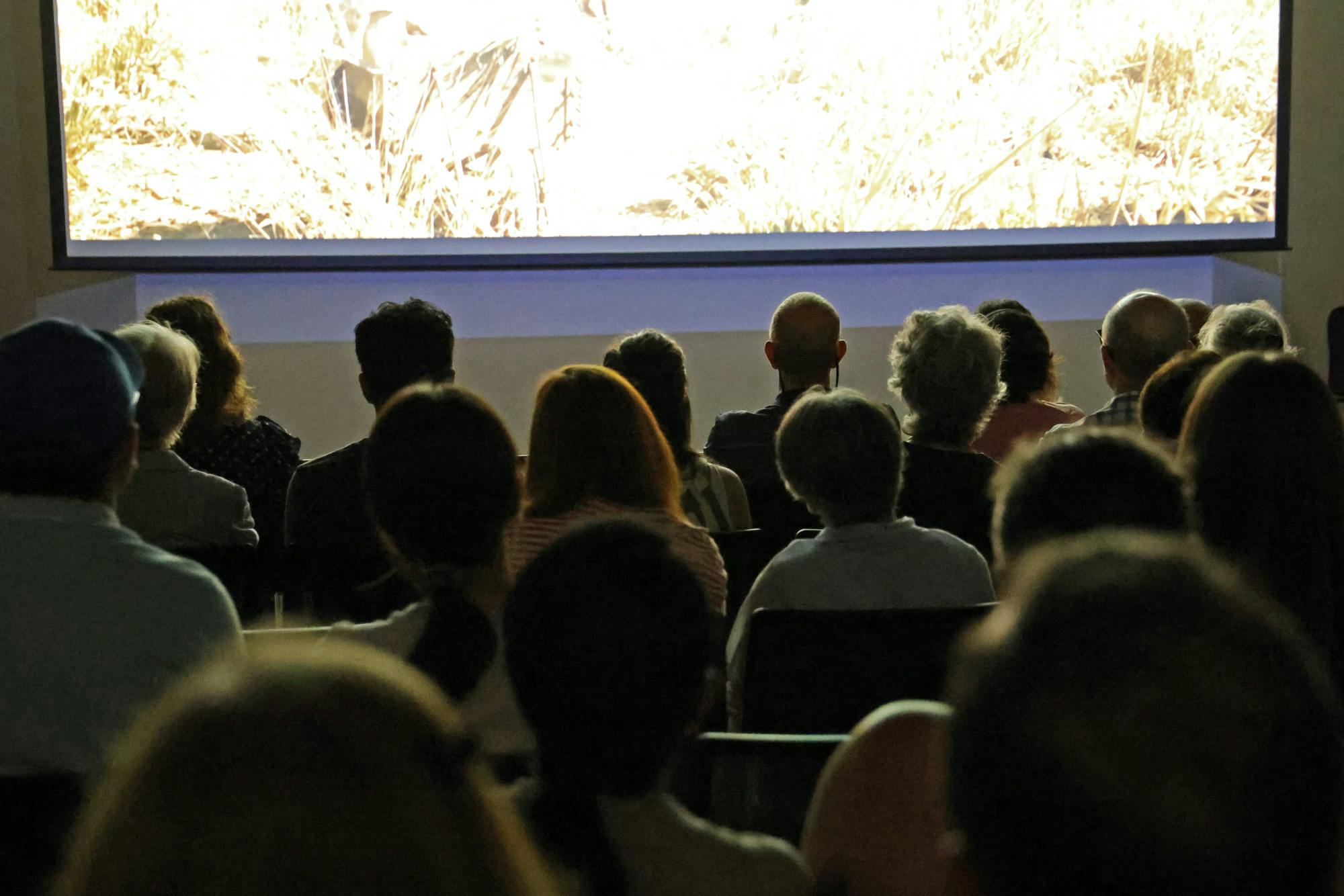 Attendees watch “La Frontera” during the 21st Gainesville Latino Film Festival, presented by the Latina Women’s League, at the Harn Museum of Art on Thursday, Sept. 11, 2025.