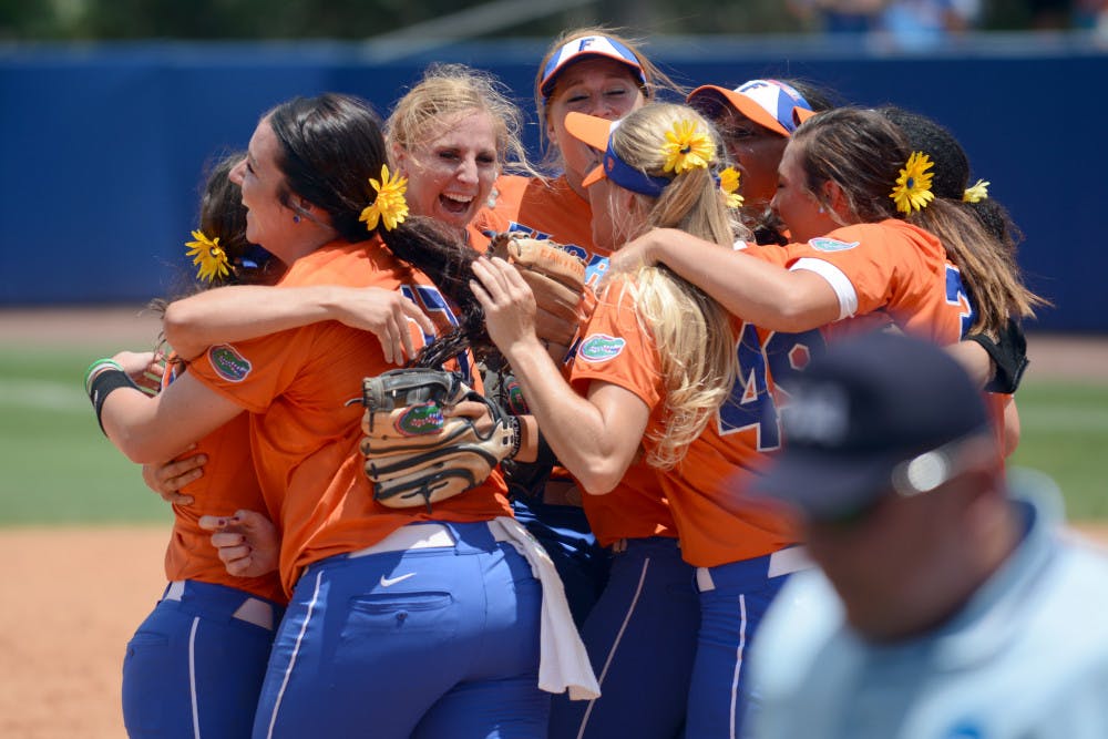 <p>UF players celebrate the final out of Sunday's 1-0 win against the Kentucky Wildcats during the 2015 NCAA Super Regionals at Katie Seashole Pressly Stadium. </p>