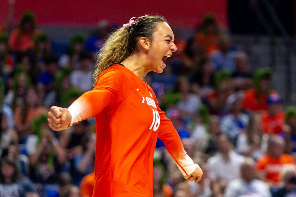 <p>Florida sophomore Kennedy Martin celebrates a service ace during the fourth set of the Gators' match vs the Kentucky Wildcats on Sunday, Sept. 29, 2024.</p>