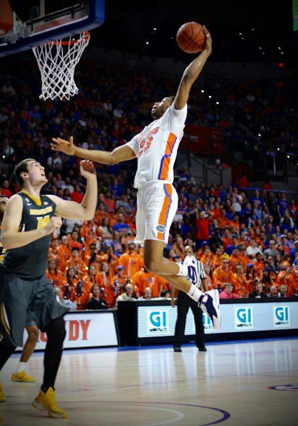 <p>UF forward Justin Leon attempts a dunk during Florida's 93-54 win over Missouri on Feb. 2, 2017, in the O'Connell Center.</p>