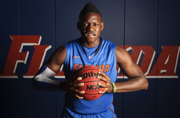 Junior Will Yeguete poses during UF’s media day on Oct. 10. Yeguete added muscle during the offseason to prepare for time at center.&nbsp;
