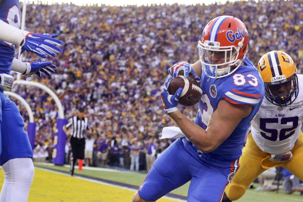 <p>UF tight end Jake McGee catches his first of two touchdown passes on Oct. 17, 2015, against LSU.</p>