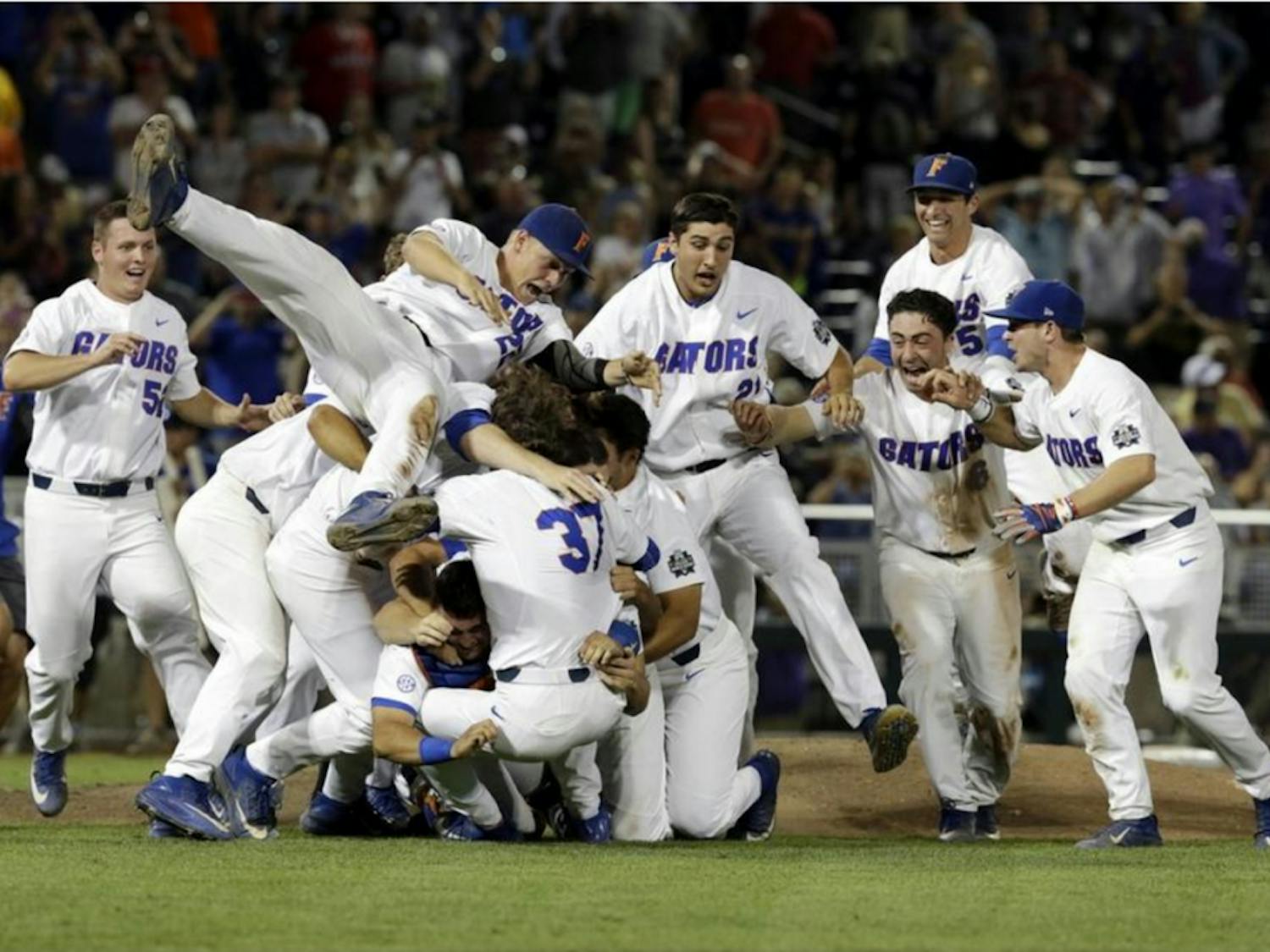 Florida's baseball team celebrates following its 6-1 victory over LSU on June 27, 2017, in Game 2 of the College World Series at TD Ameritrade Park in Omaha, Nebraska.