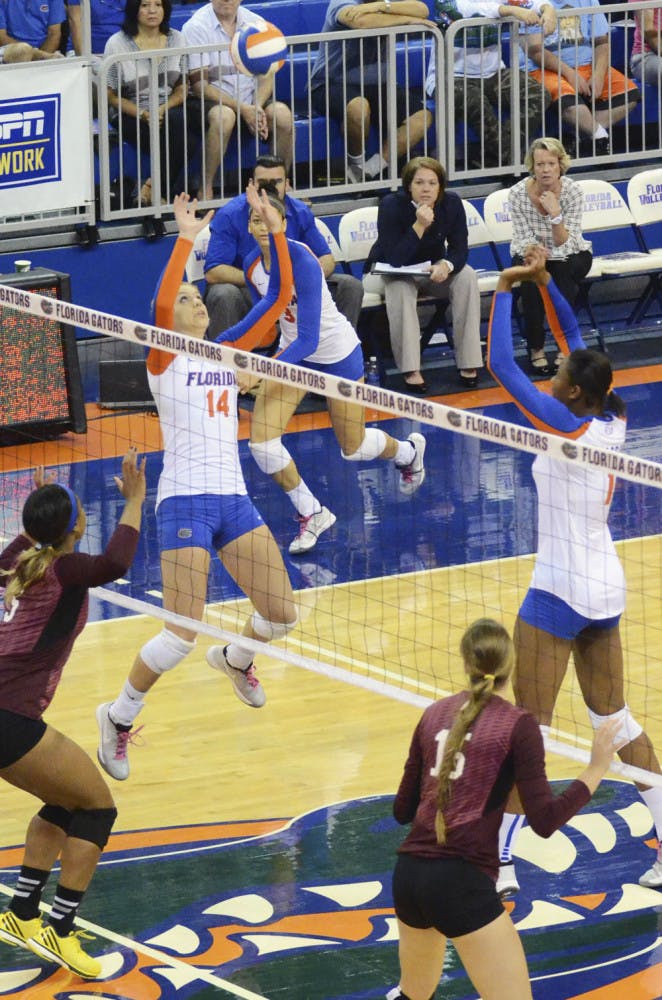 Abby Detering sets the ball during Florida's 3-0 win against Mississippi State on Sunday in the O'Connell Center