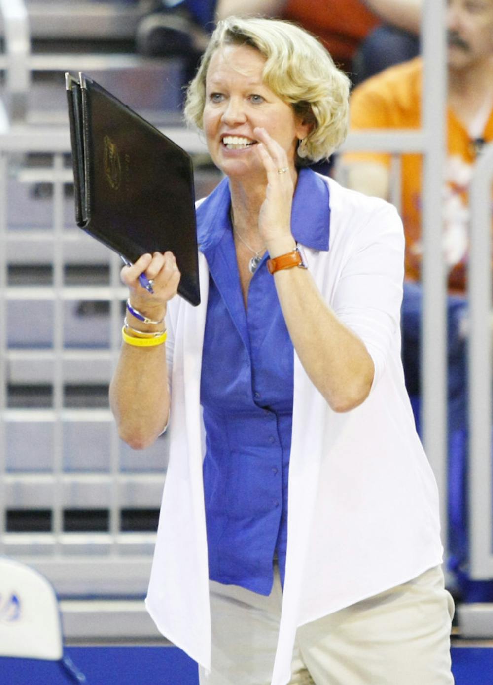 <p>Florida coach Mary Wise claps during a 3-0 win against FIU on Aug. 24, 2012 in the O'Connell Center.</p>