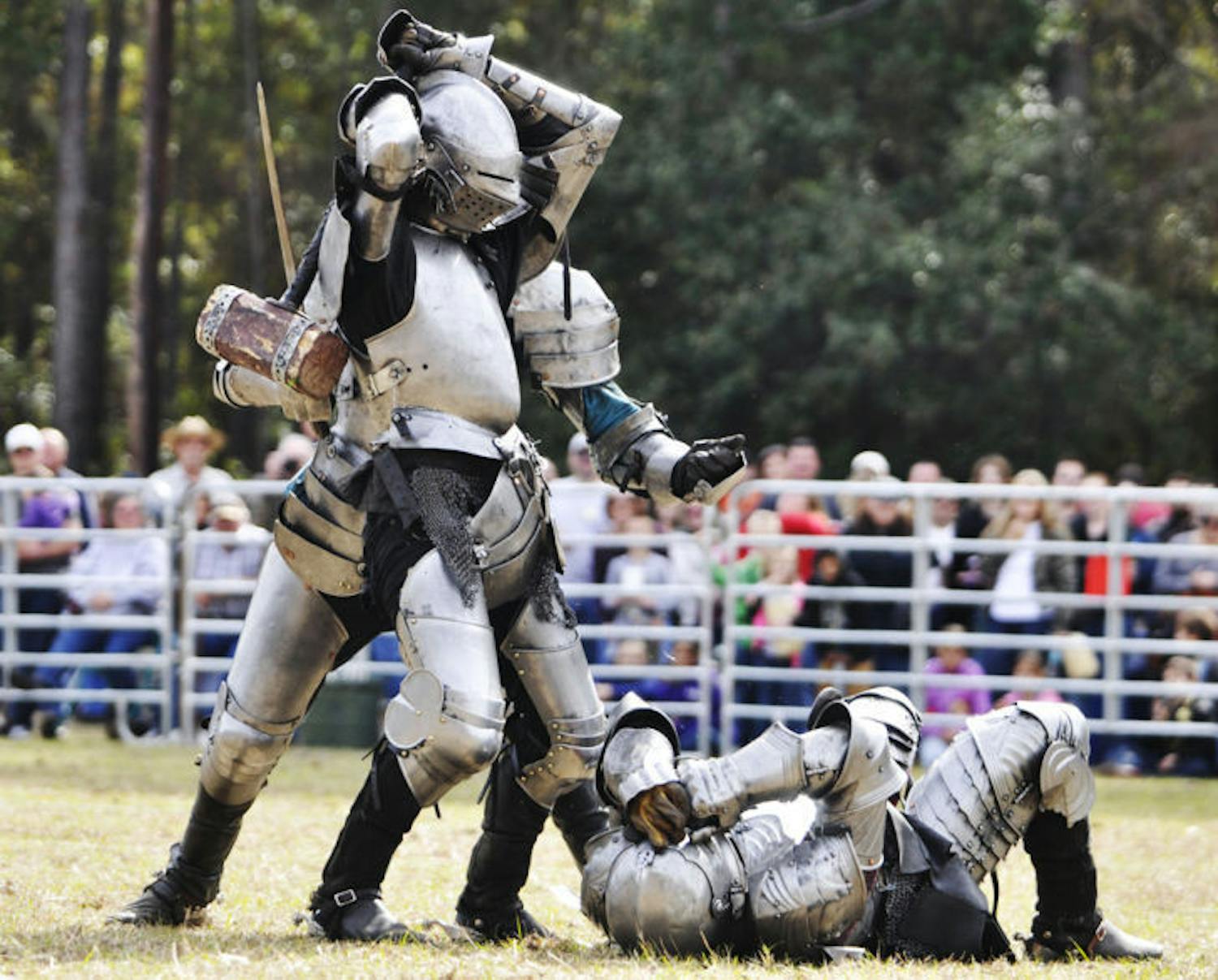 Knights engage during battle at the Hoggetowne Medieval Faire on Sunday. The festivities will continue this weekend at the Alachua County Fairgrounds.
