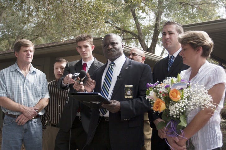 Jeff McAdams, president of the Alachua County Fraternal Order of Police lodge, thanks Sen. Steve Oelrich on Tuesday for opposing a state bill that would privatize Florida prisons.