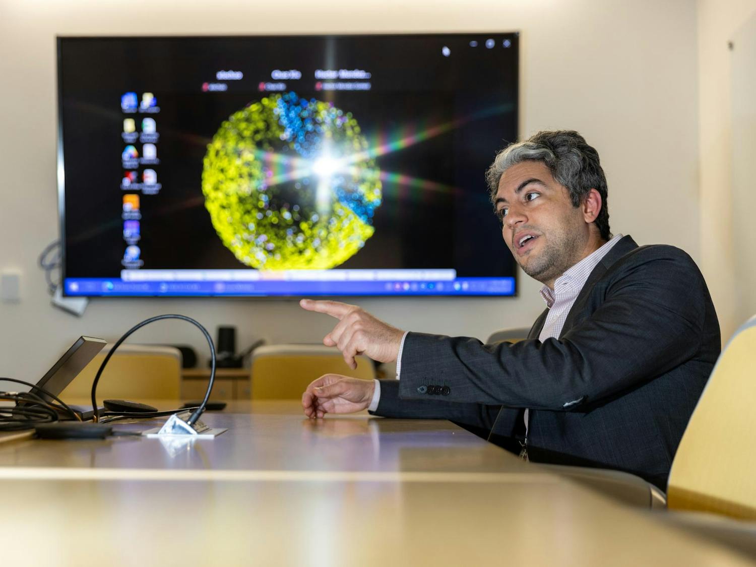 Principal Investigator of the RNA Engineering Laboratory Elias Sayour discusses a potential new vaccine for pediatric brain cancer Assistant Scientist Chao Xie on Friday, Aug. 29, 2025.