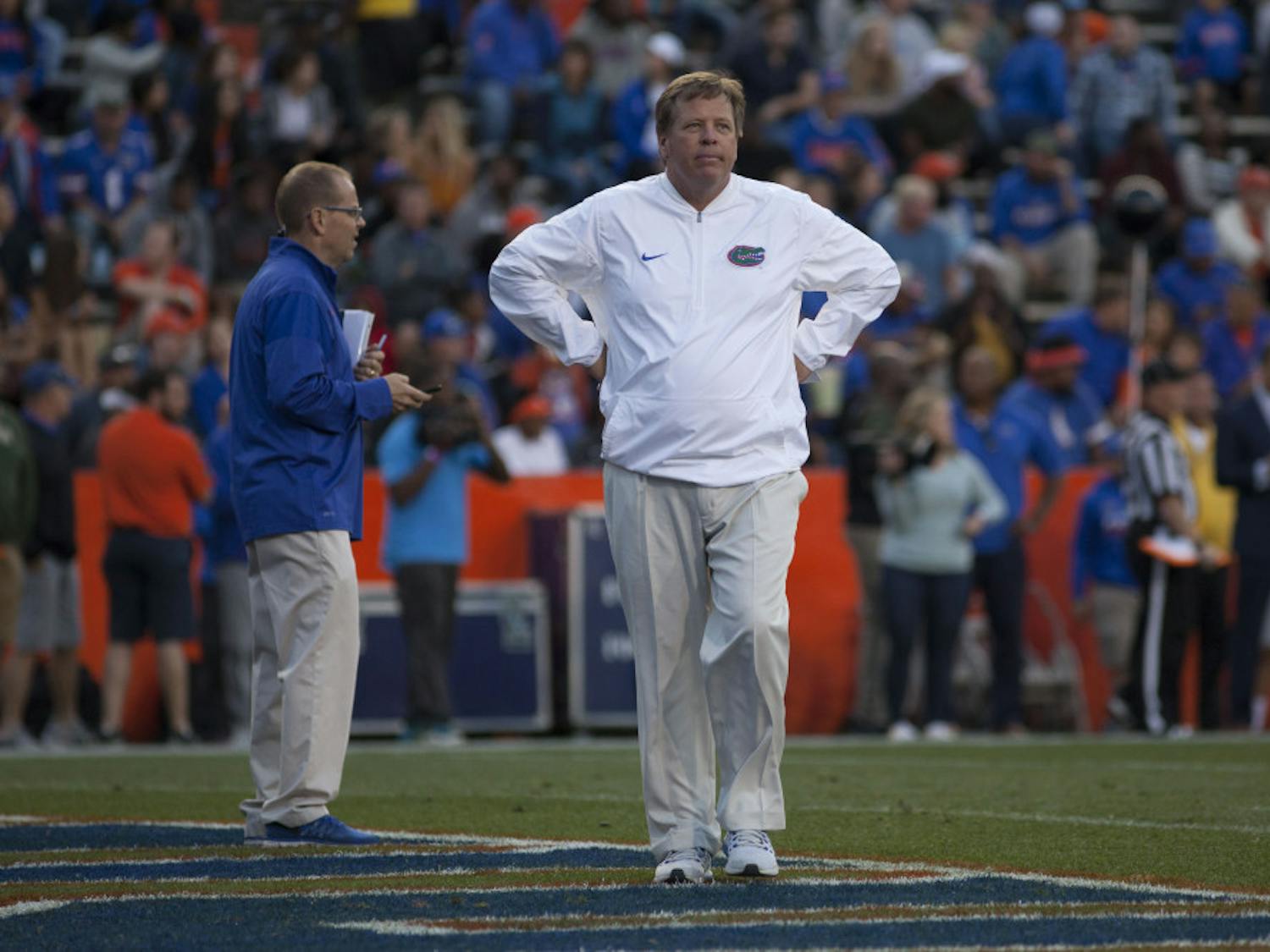 UF coach Jim McElwain watches on during UF's Orange and Blue Debut on April 7, 2017, at Ben Hill Griffin Stadium.