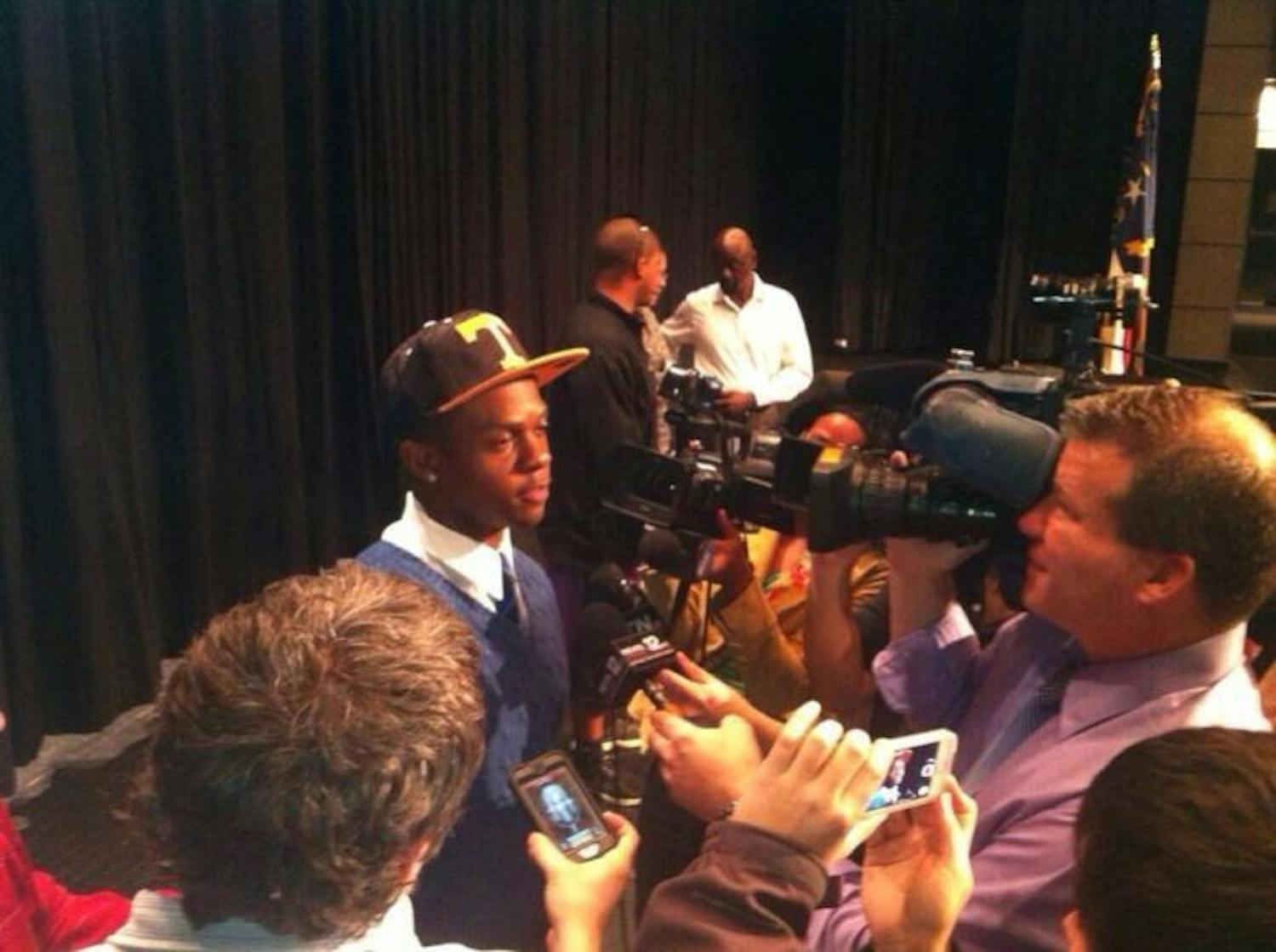 Four-star running back Derrell Scott is interviewed by reporters after choosing Tennessee over Florida.