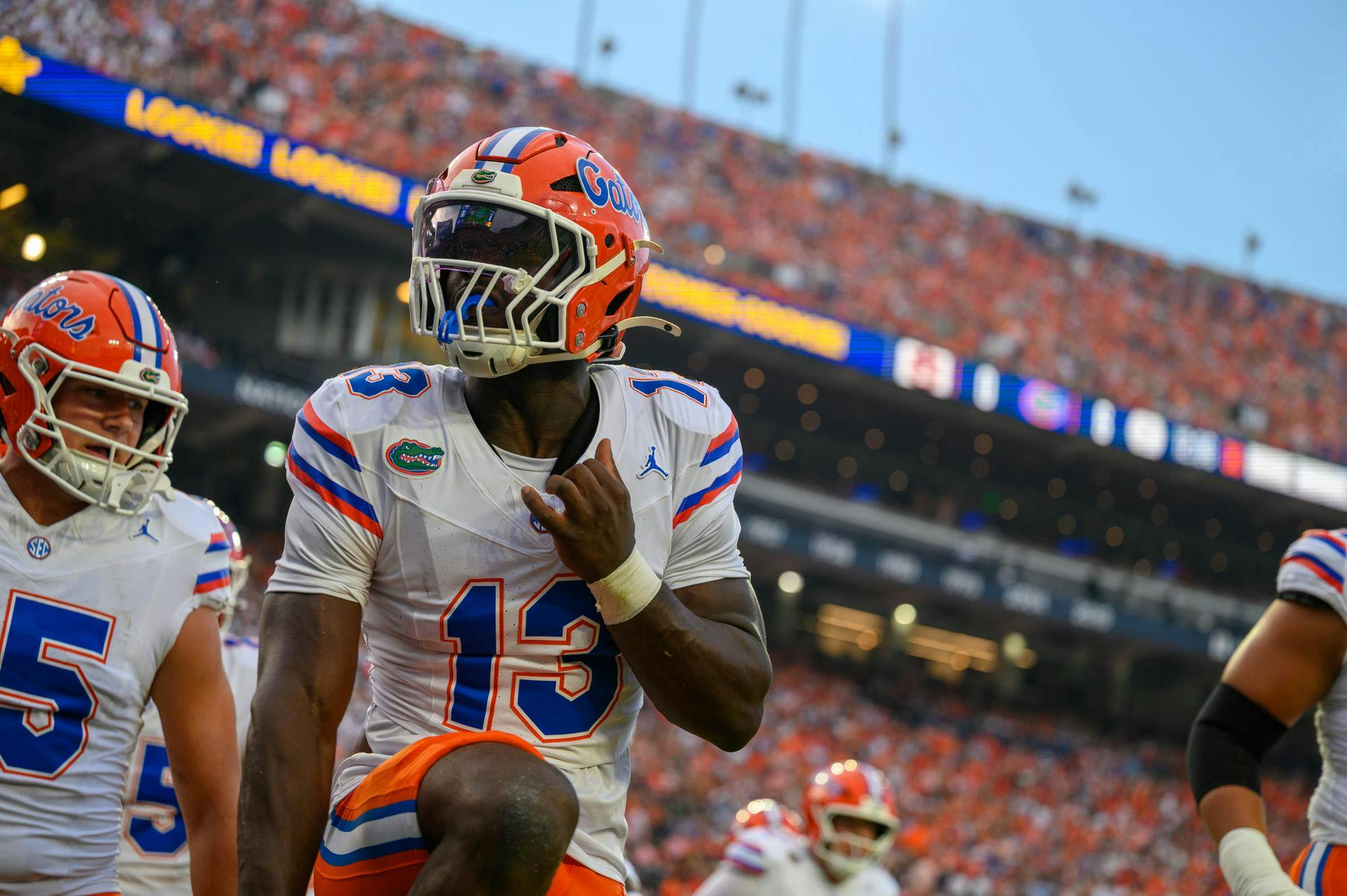 Florida running back Jadan Baugh (13) hits the Heisman pose during the first half of an NCAA college football game against Auburn, Saturday, Sept. 19, 2026, in Auburn, Ala.